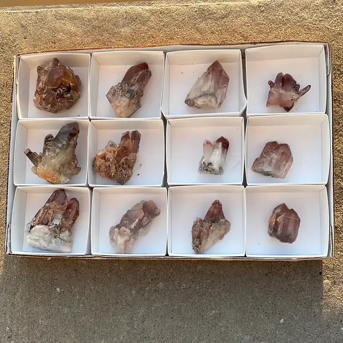 1.29kg Lot of 11 Ishuko Red Phantom Quartz, Hematite included Quartz from the Central Province of Zambia