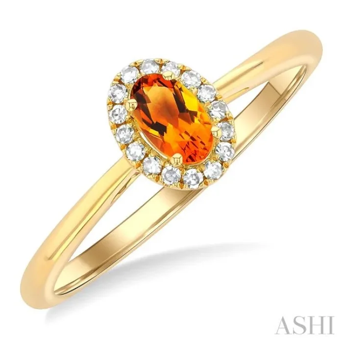5×3 MM Oval Shape Citrine and 1/20 Ctw Single Cut Diamond Halo Semi-Precious Ring in 14K Yellow Gold