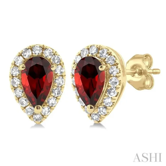 5×3 MM Pear Shape Garnet and 1/8 Ctw Single Cut Diamond Halo Semi-Precious Stud Earrings in 10K Yellow Gold